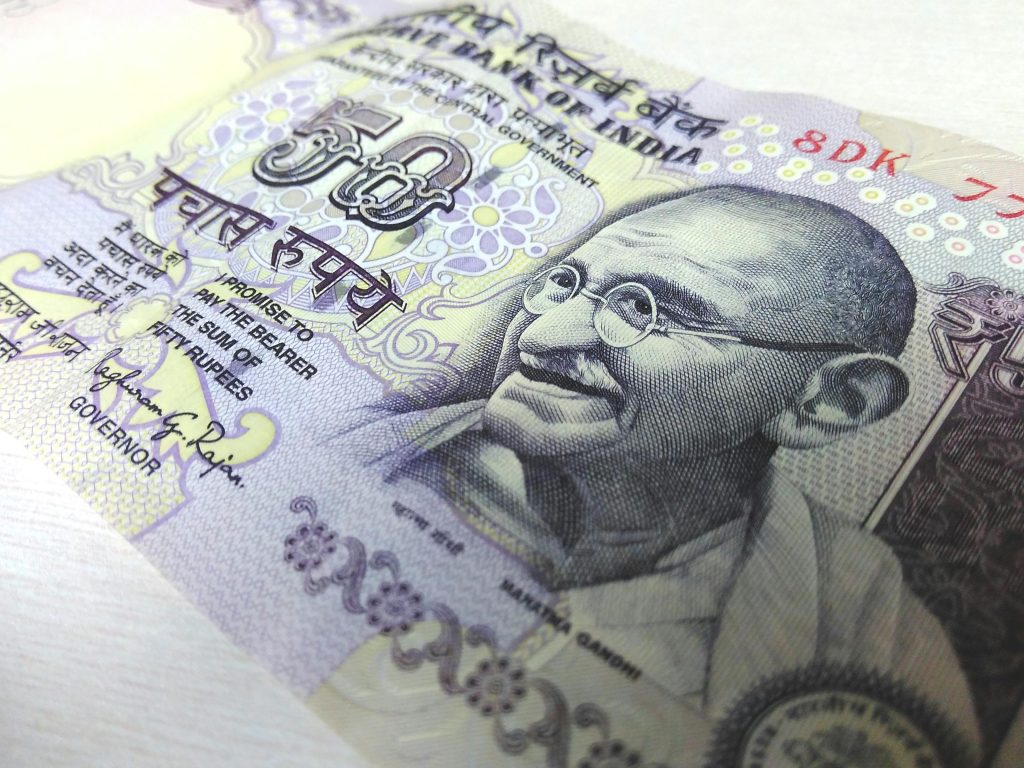 Hindi and English are used on the front side of the currency of India.